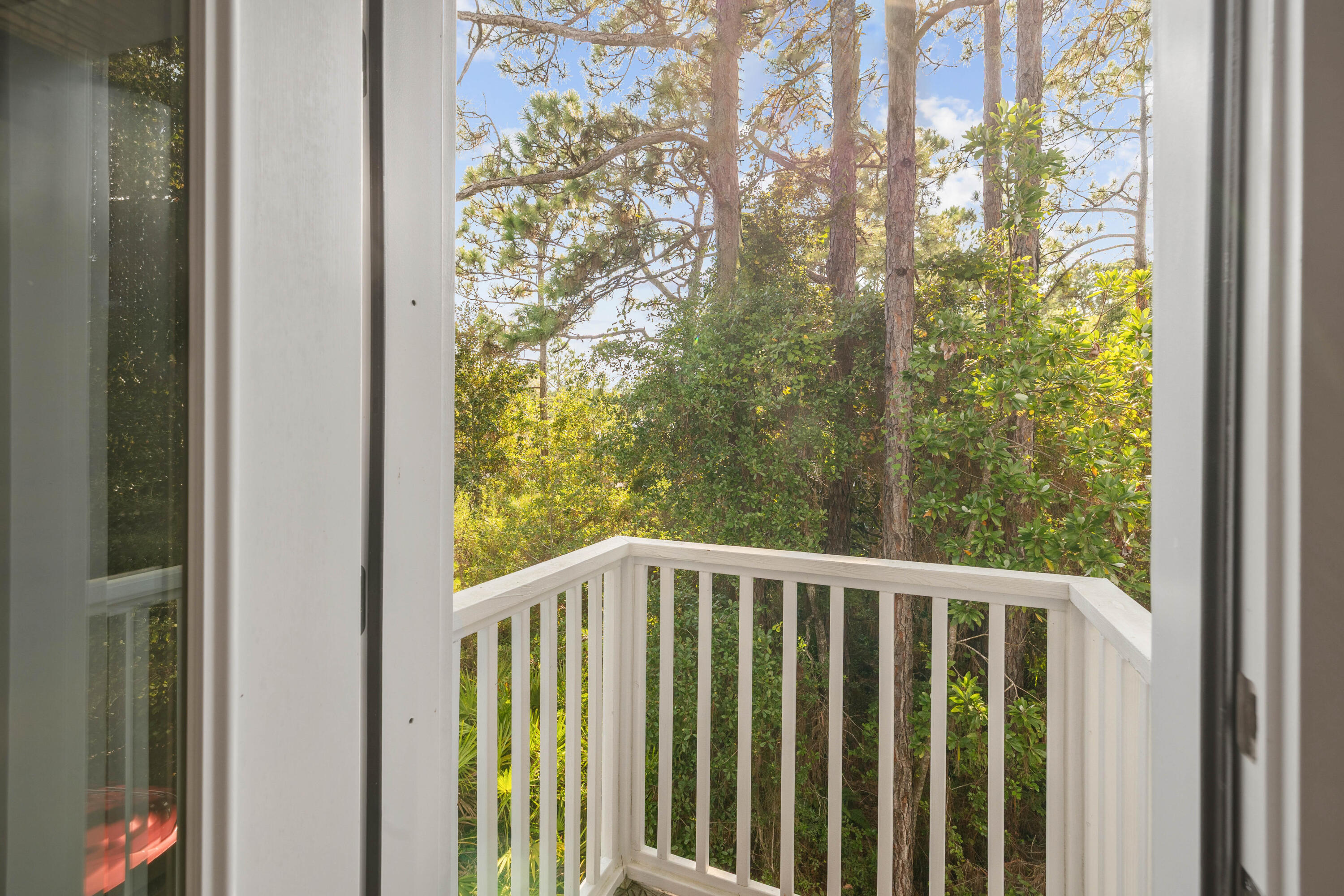 298 Cullman Avenue Santa Rosa Beach, FL 32459 - Photo 45 of 63 a view of a balcony with wooden fence and floor