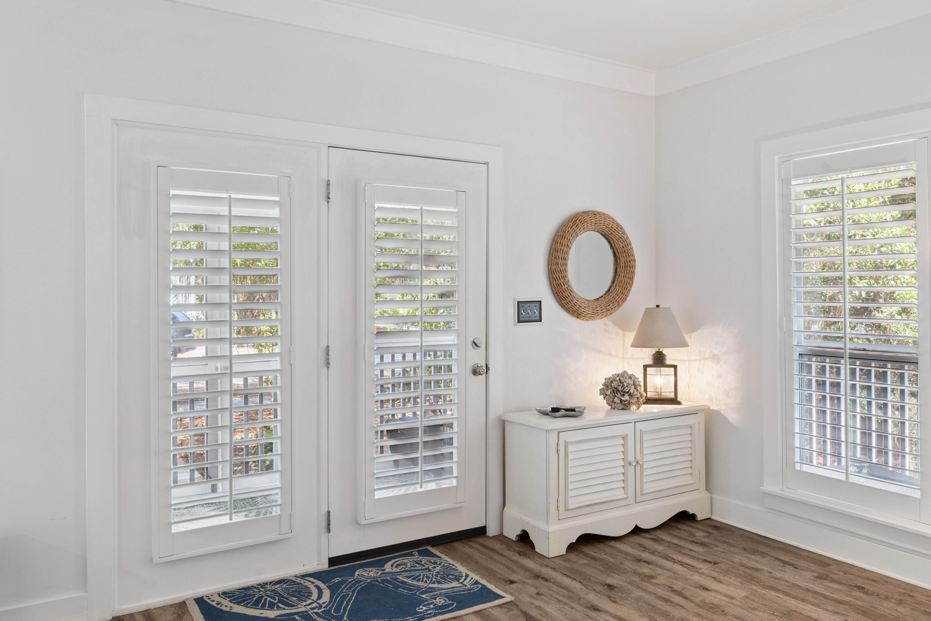 298 Cullman Avenue Santa Rosa Beach, FL 32459 - Photo 5 of 63 a room with wooden floor and a window