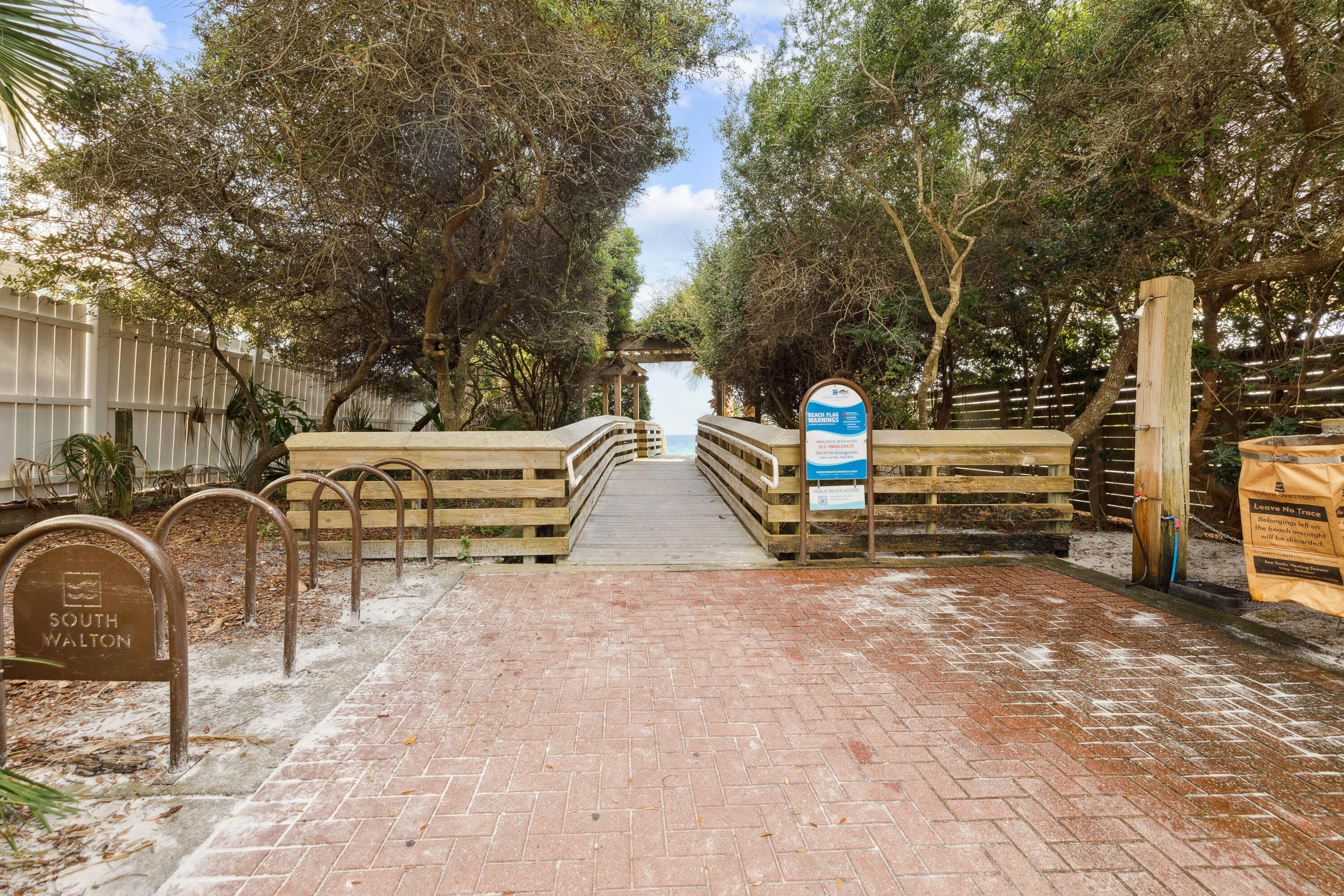 298 Cullman Avenue Santa Rosa Beach, FL 32459 - Photo 58 of 63 a backyard of a house with table and chairs