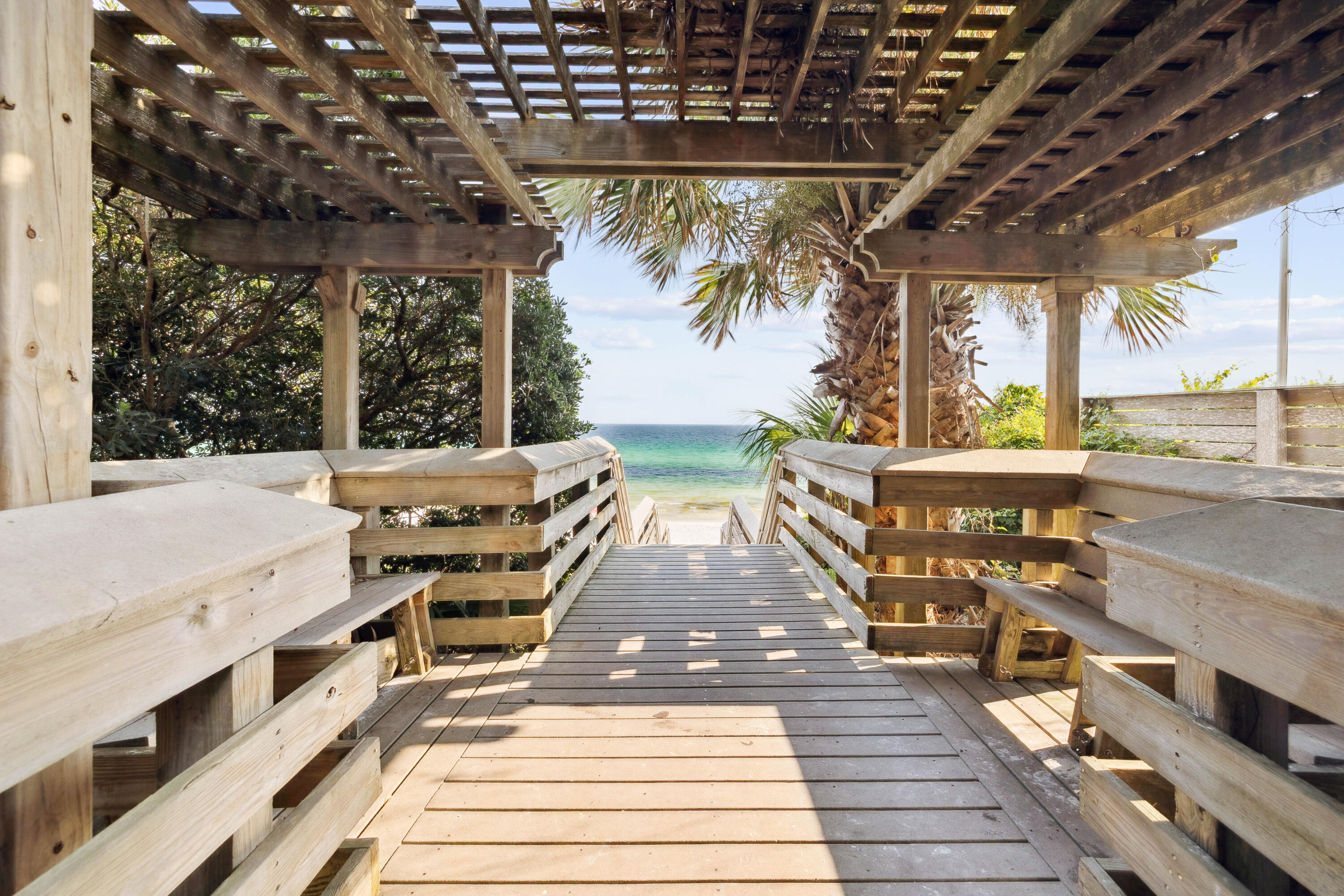 298 Cullman Avenue Santa Rosa Beach, FL 32459 - Photo 59 of 63 a view of a balcony with chairs and wooden floor