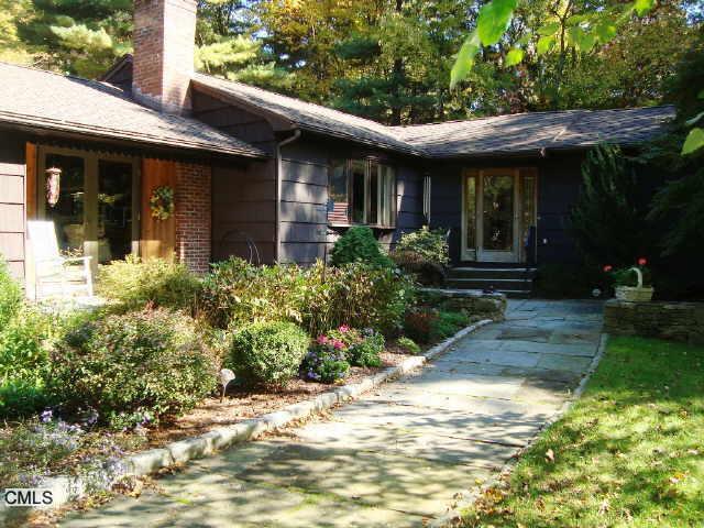 155 Plumtrees Road Bethel, CT 06801 - Photo 1 of 1 a front view of a house with garden