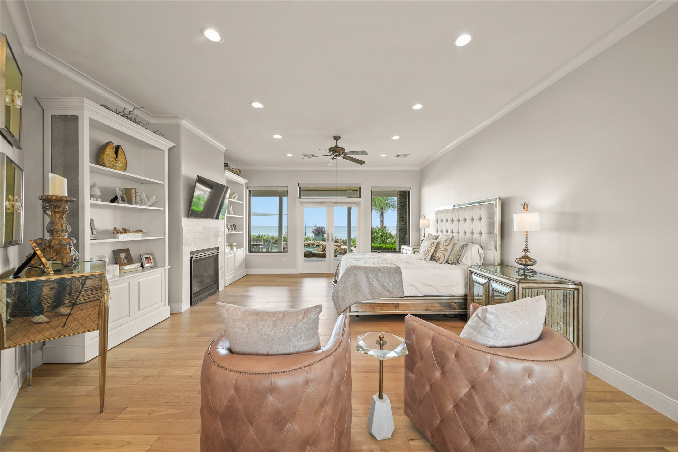 206 Avenue A Dickinson, TX 77539 - Photo 14 of 38 Primary Bedroom, Fireplace, Bookshelves & Storage, New Flooring.