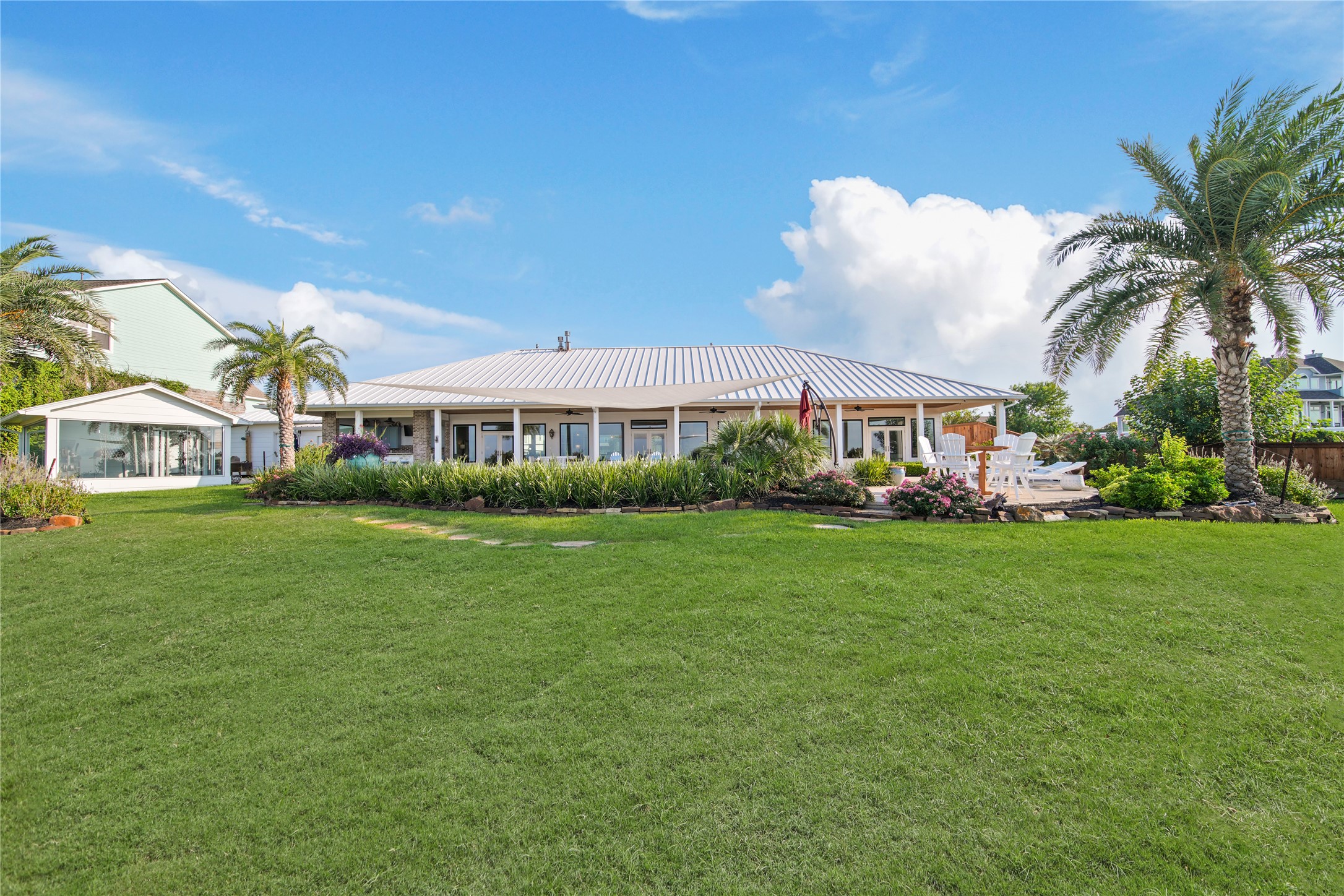 206 Avenue A Dickinson, TX 77539 - Photo 2 of 38 Located on the Protected North Shoreline of Eagle Point (Calm Waters, Gentle Breeze) 135 Ft of Water Front Property.