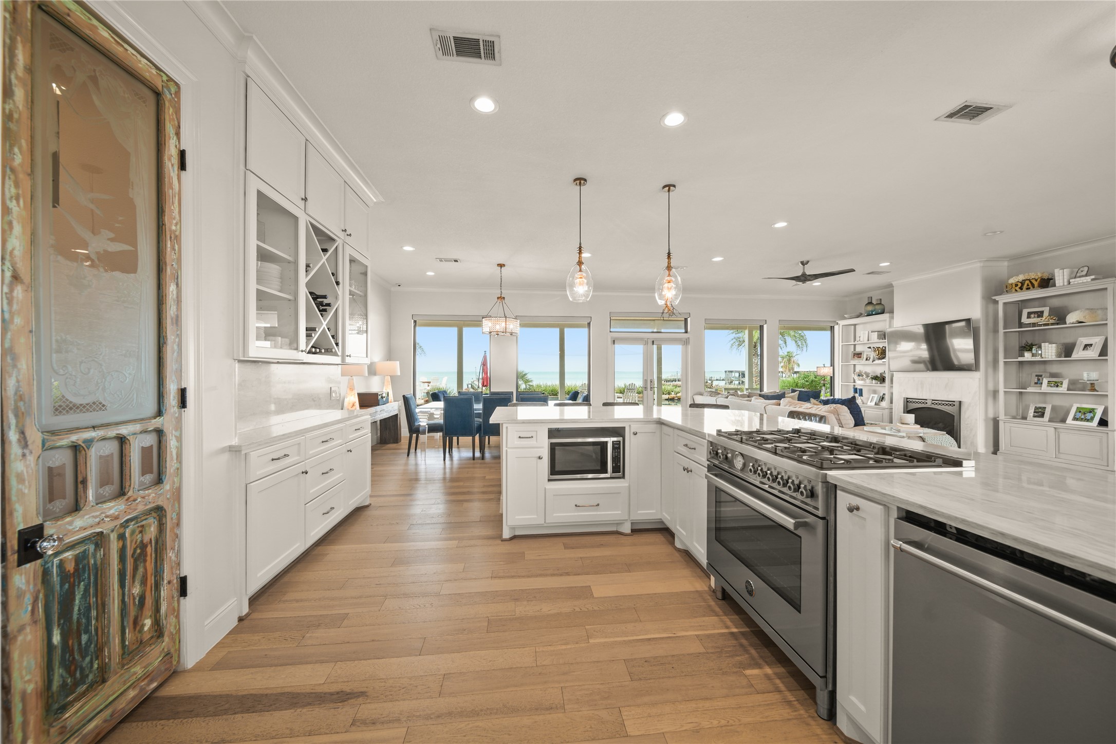 206 Avenue A Dickinson, TX 77539 - Photo 9 of 38 Totally Remodeled Kitchen! Antique Door to Pantry all open to the Family Room and Dining Area make Entertaining so easy and FUN!