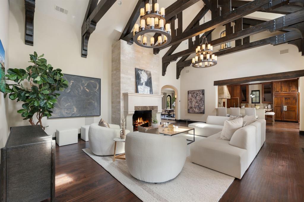4120 Cochran Chapel Road Dallas, TX 75220 - Photo 11 of 40 a living room with furniture a fireplace and a potted plant