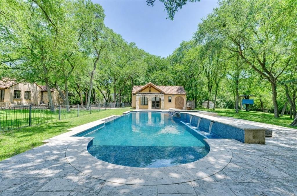 4120 Cochran Chapel Road Dallas, TX 75220 - Photo 31 of 40 a view of a swimming pool with a yard