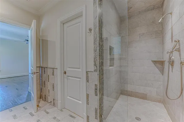 a view of green field with trees in the background