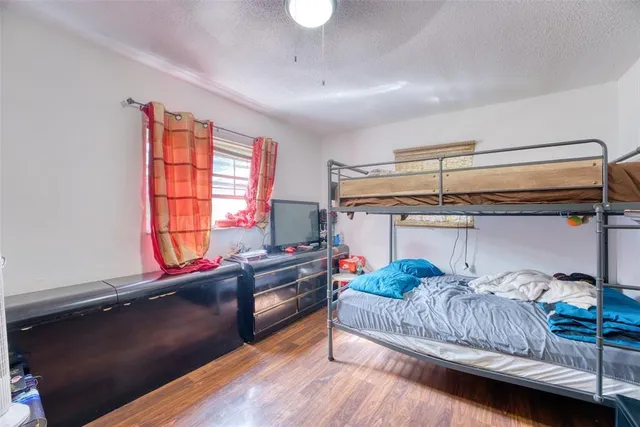 a bathroom with a shower and a toilet