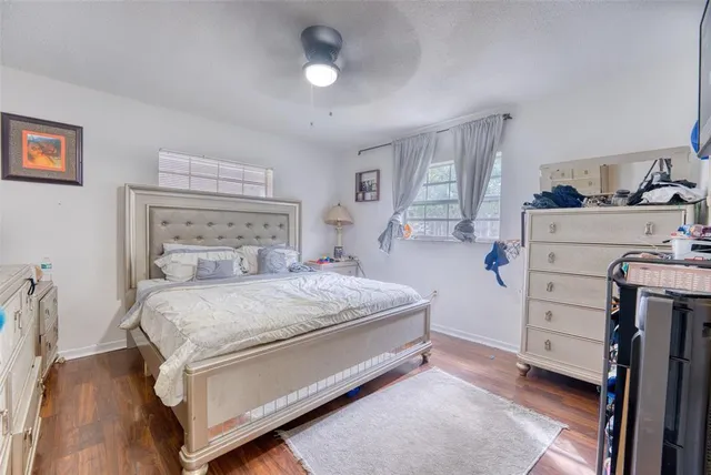 a bathroom with a sink mirror and vanity