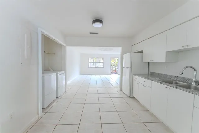 a house view with a backyard space