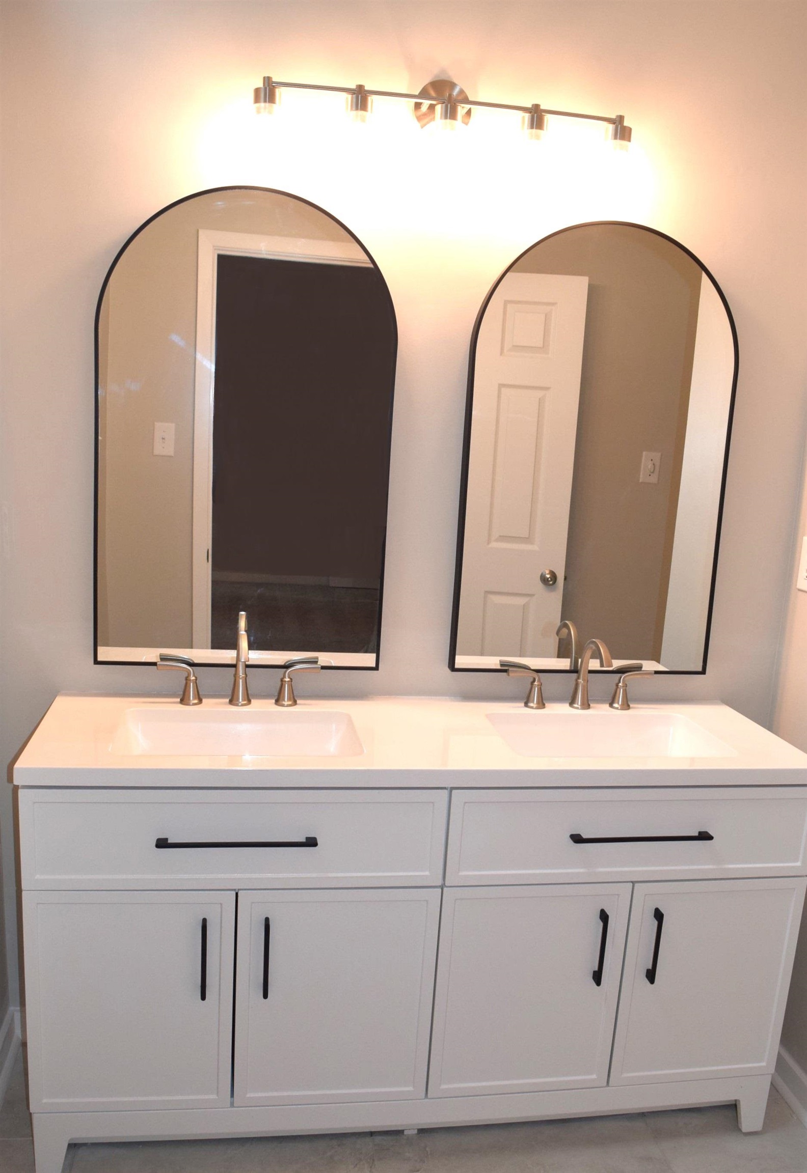 1831 Allenby Green, Unit 1831 Germantown, TN 38139 - Photo 11 of 25 a bathroom with double vanity sinks and a mirror