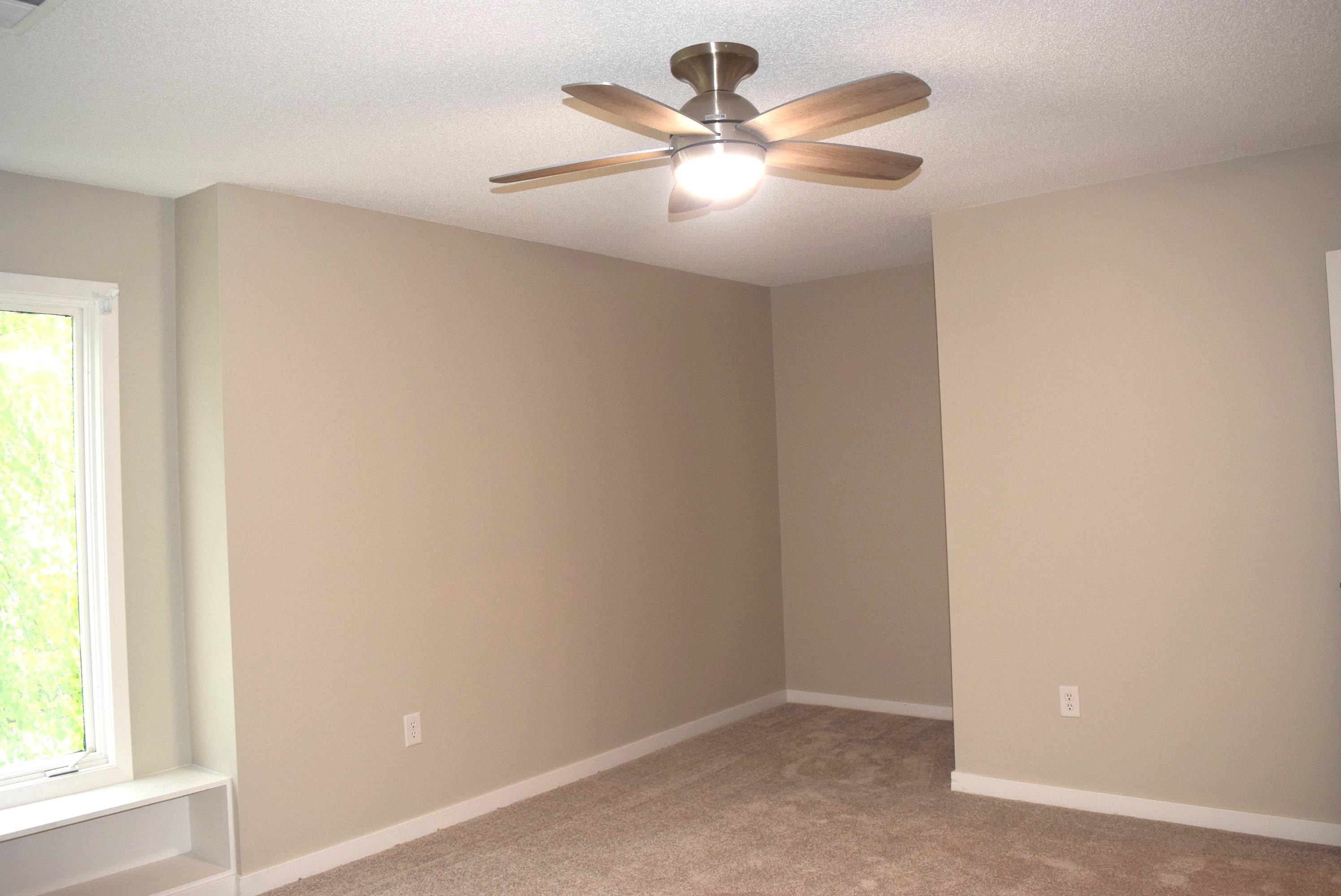 1831 Allenby Green, Unit 1831 Germantown, TN 38139 - Photo 14 of 25 an empty room with windows and fan