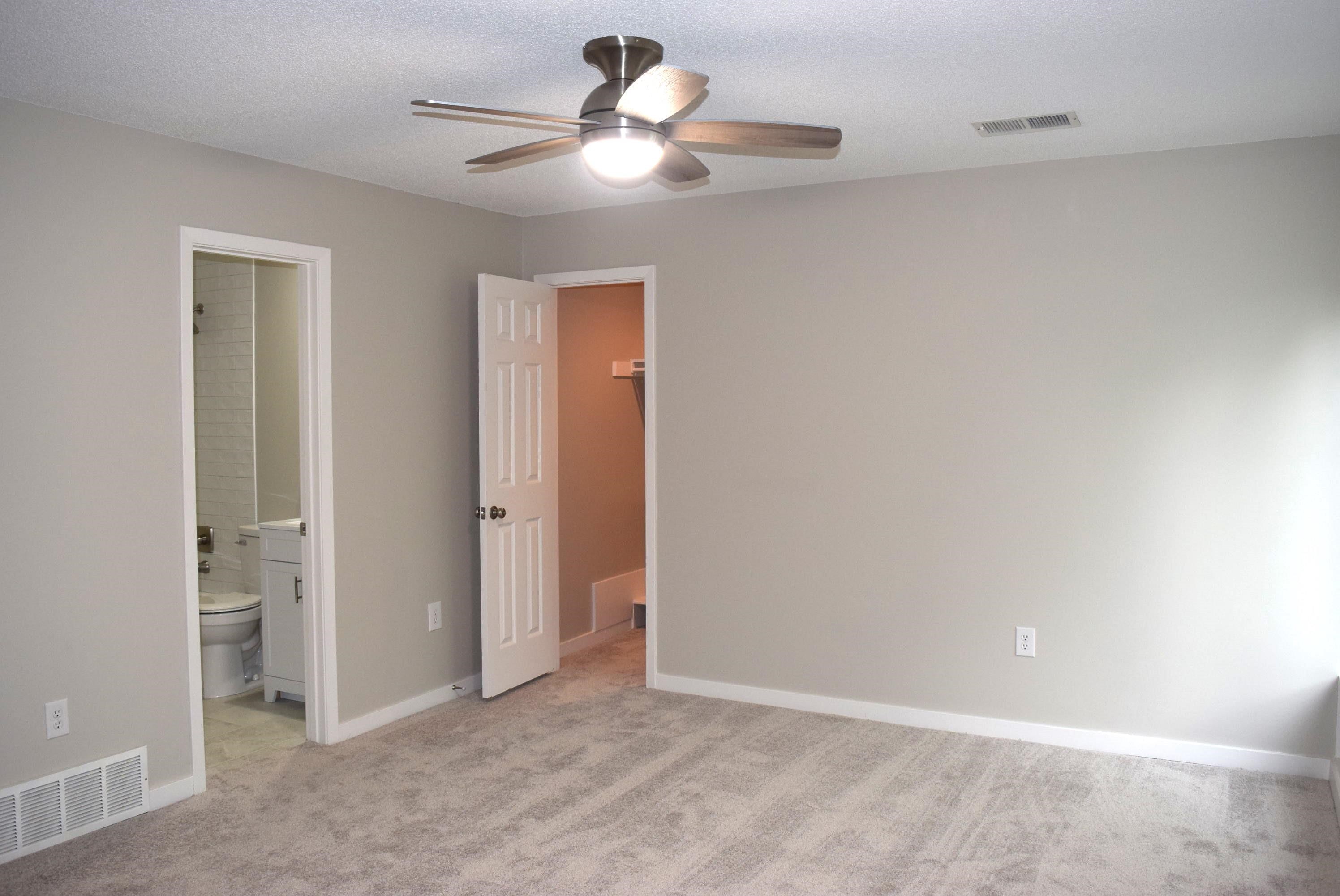 1831 Allenby Green, Unit 1831 Germantown, TN 38139 - Photo 15 of 25 an empty room with closet and a ceiling fan