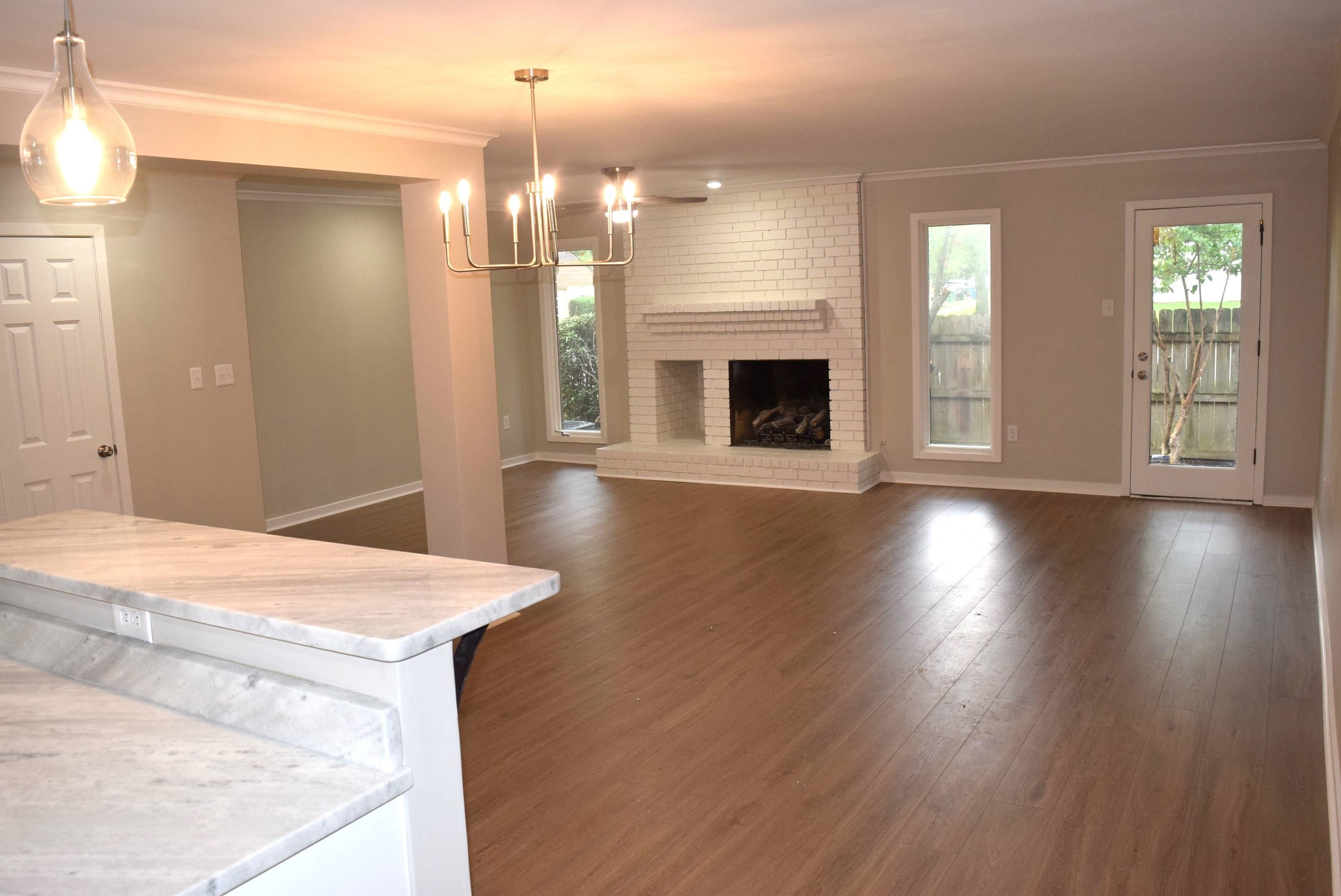 1831 Allenby Green, Unit 1831 Germantown, TN 38139 - Photo 25 of 25 a view of livingroom with hardwood floor and a fireplace