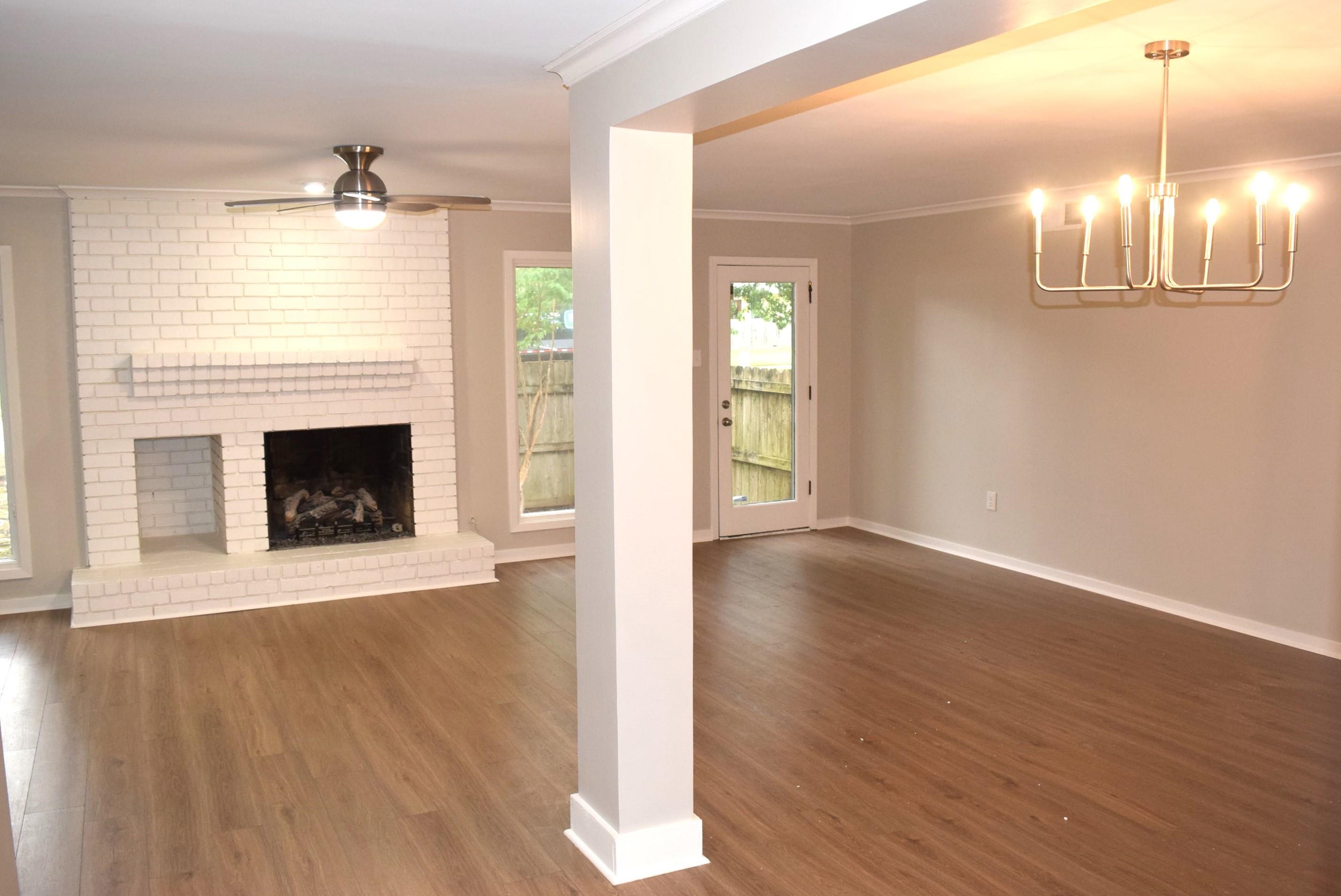1831 Allenby Green, Unit 1831 Germantown, TN 38139 - Photo 5 of 25 a view of an empty room with wooden floor and a window