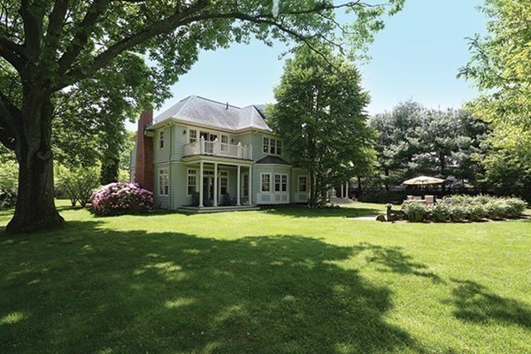 195 Newton Street Brookline, MA 02467 - Photo 4 of 16 a front view of a house with a garden