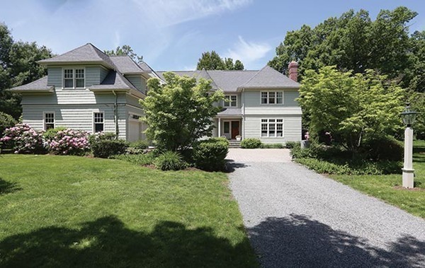 195 Newton Street Brookline, MA 02467 - Photo 7 of 16 a front view of a house with garden