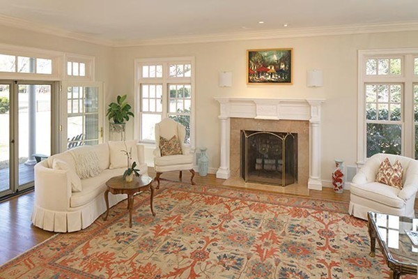 195 Newton Street Brookline, MA 02467 - Photo 9 of 16 a living room with furniture and a fireplace