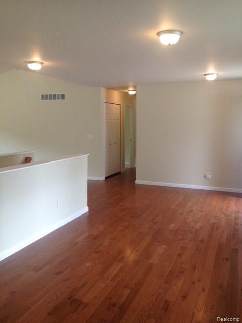 3528 Warner Road Howell, MI 48855 - Photo 16 of 61 Flex room - wood flooring