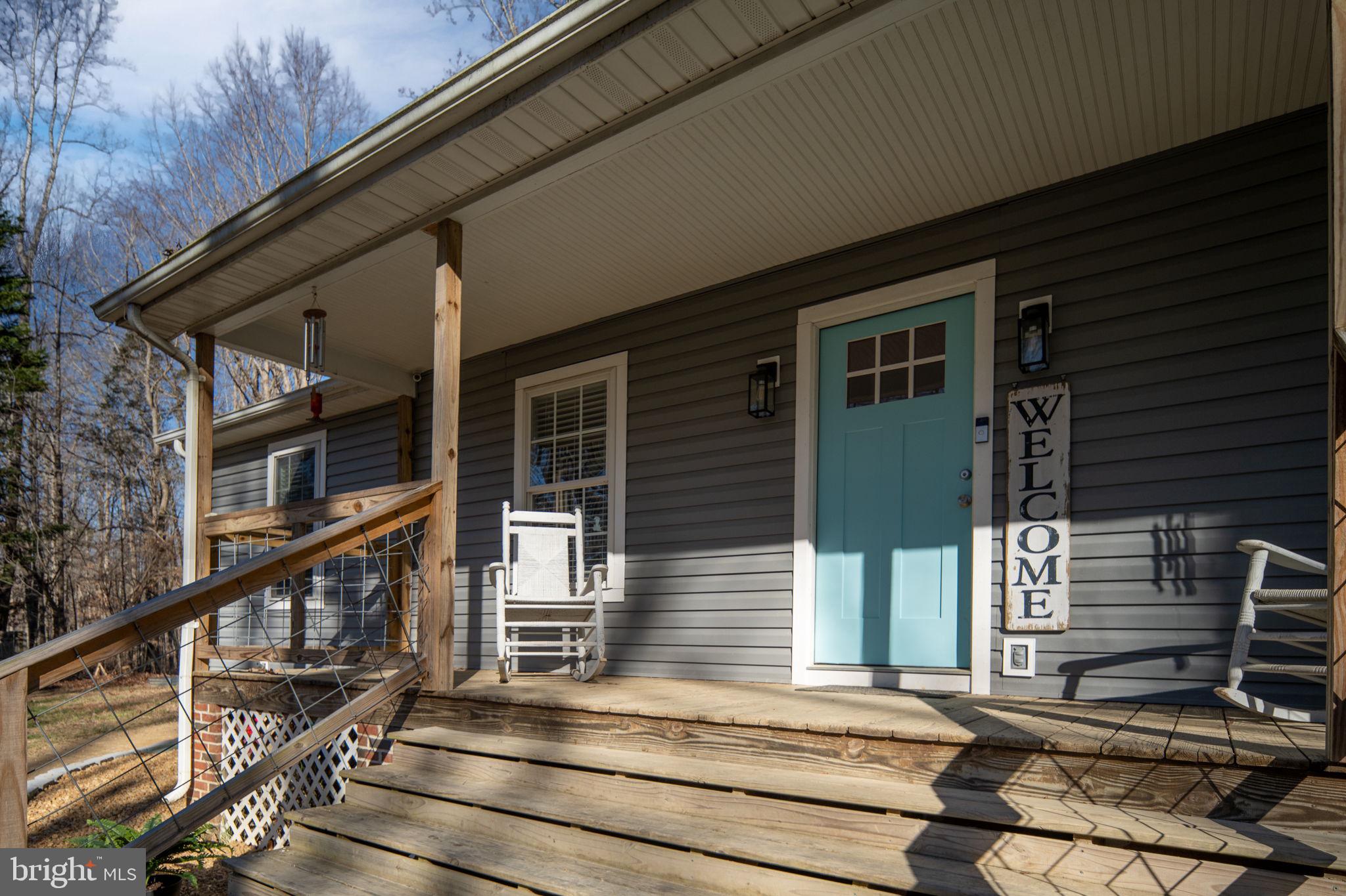 435 Halls Store Road Mineral, VA 23117 - Photo 14 of 59 a view of house with wooden stairs