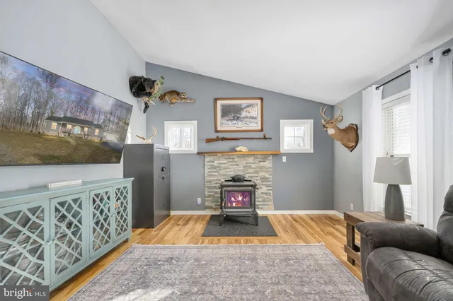 a kitchen with a sink stainless steel appliances and cabinets