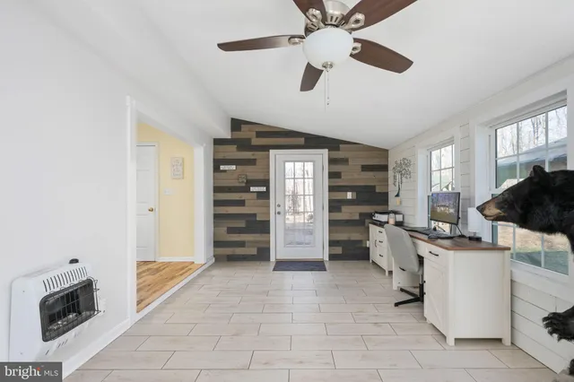 a bedroom with a bed and furniture