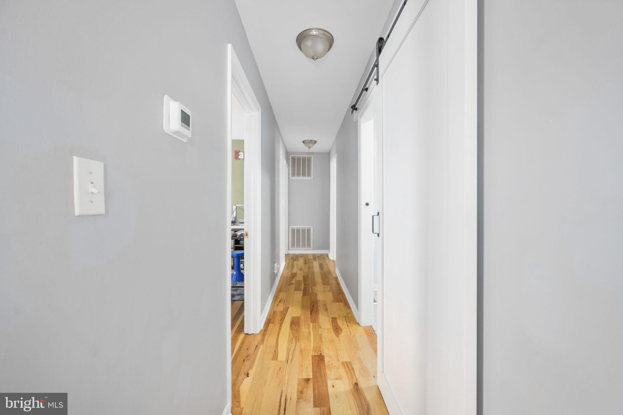 435 Halls Store Road Mineral, VA 23117 - Photo 30 of 59 a view of hallway with wooden floor