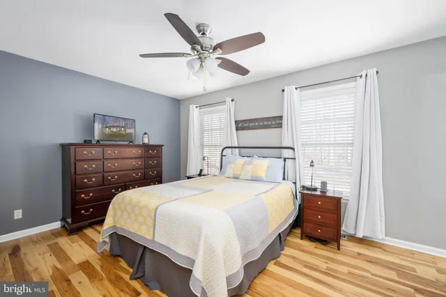 a view of a building with large trees