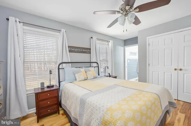a view of a two chairs and table in the patio