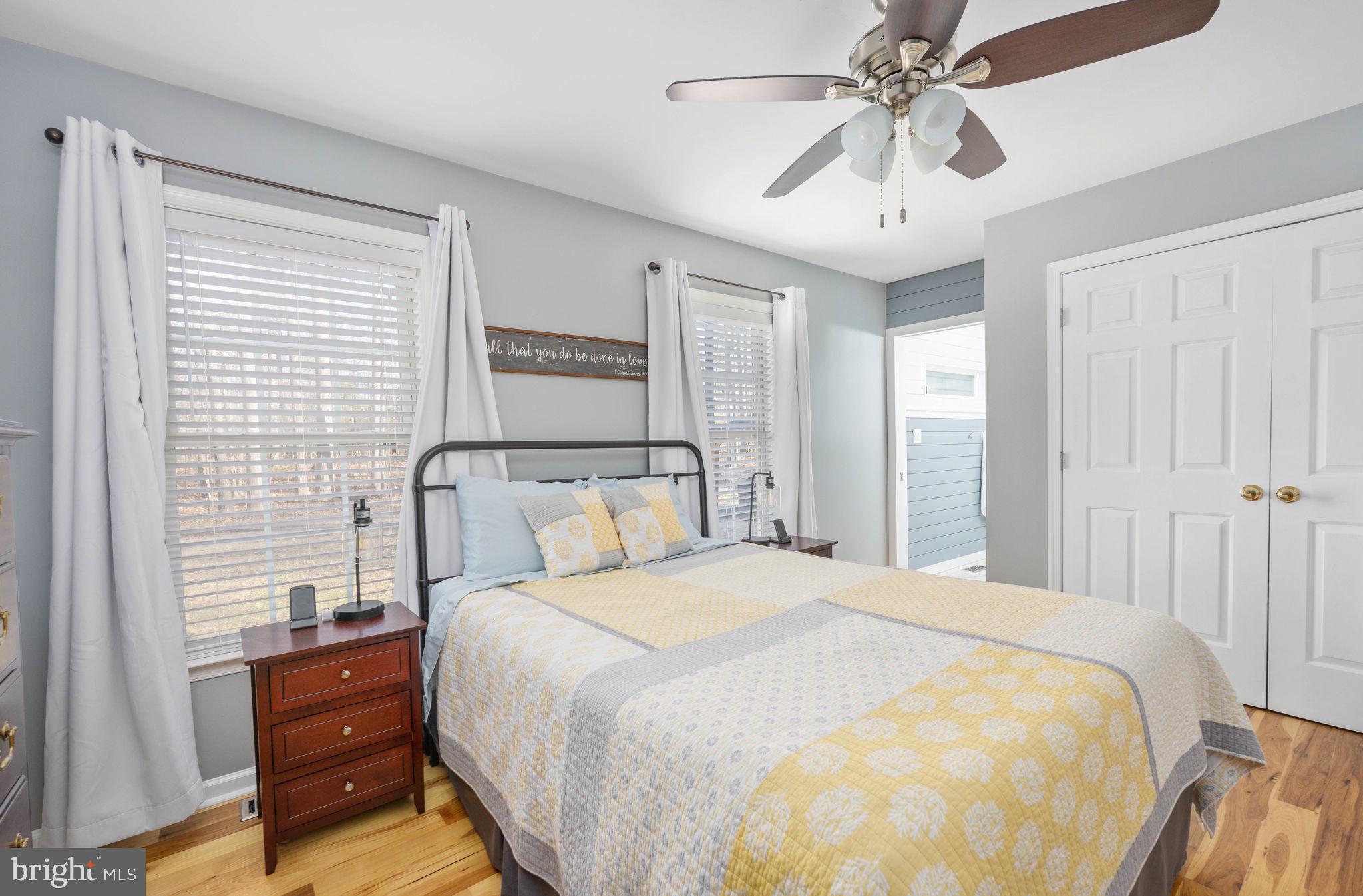 435 Halls Store Road Mineral, VA 23117 - Photo 40 of 59 a bedroom with a bed and a chandelier