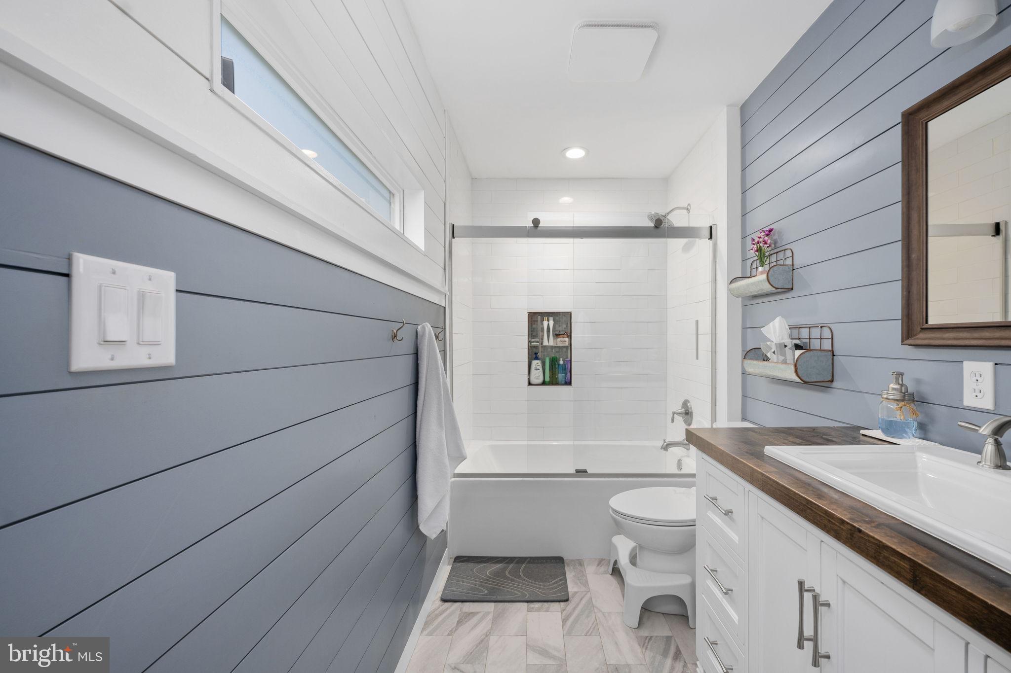 435 Halls Store Road Mineral, VA 23117 - Photo 42 of 59 a bathroom with a sink a toilet and shower