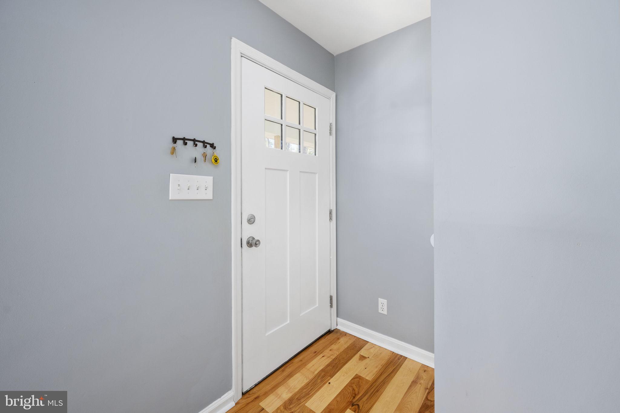 435 Halls Store Road Mineral, VA 23117 - Photo 44 of 59 a view of room with window and wooden floor