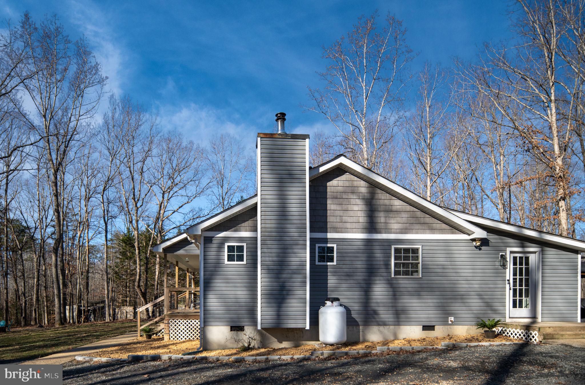 435 Halls Store Road Mineral, VA 23117 - Photo 46 of 59 a front view of a house with garage