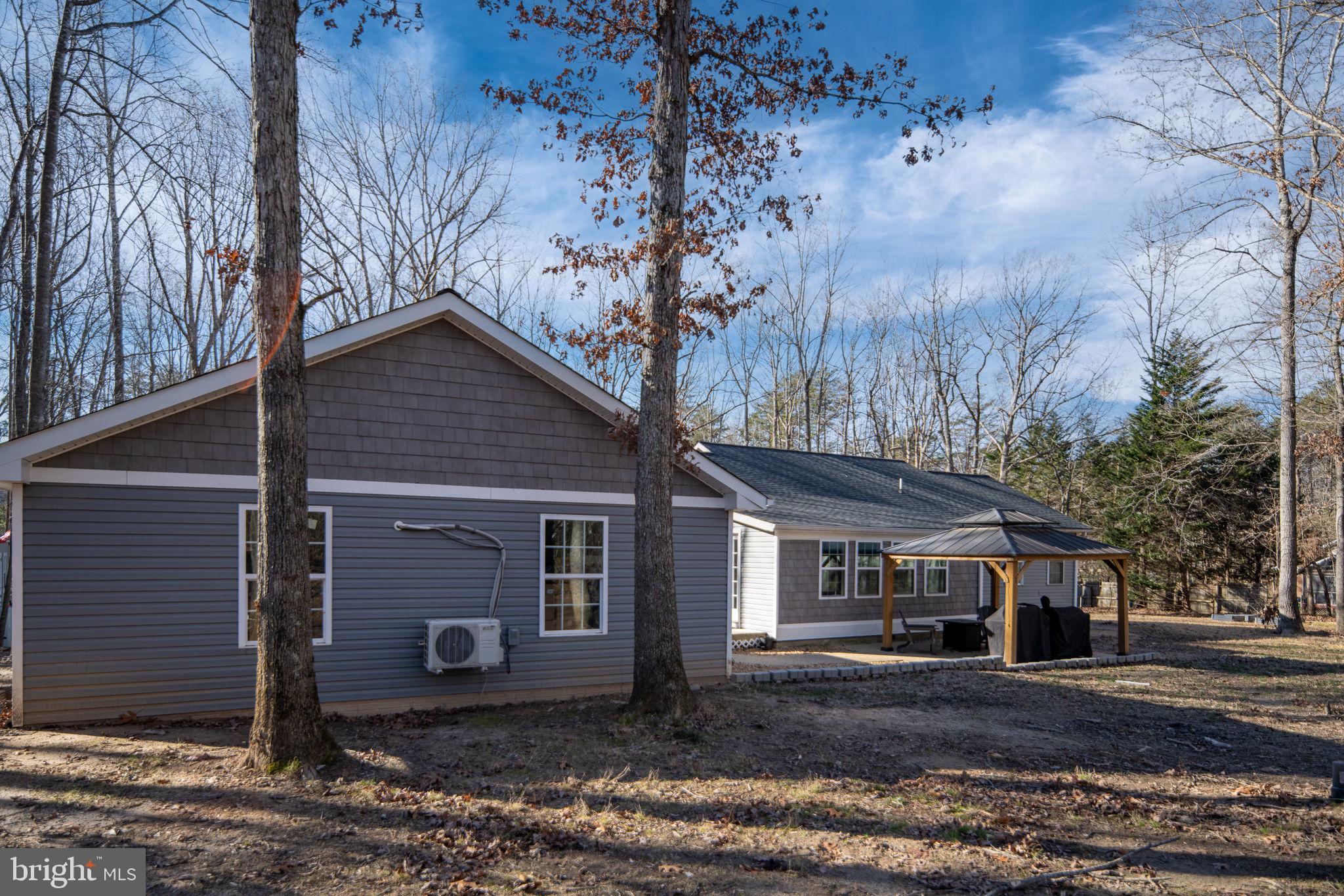 435 Halls Store Road Mineral, VA 23117 - Photo 50 of 59 a view of a house with a yard