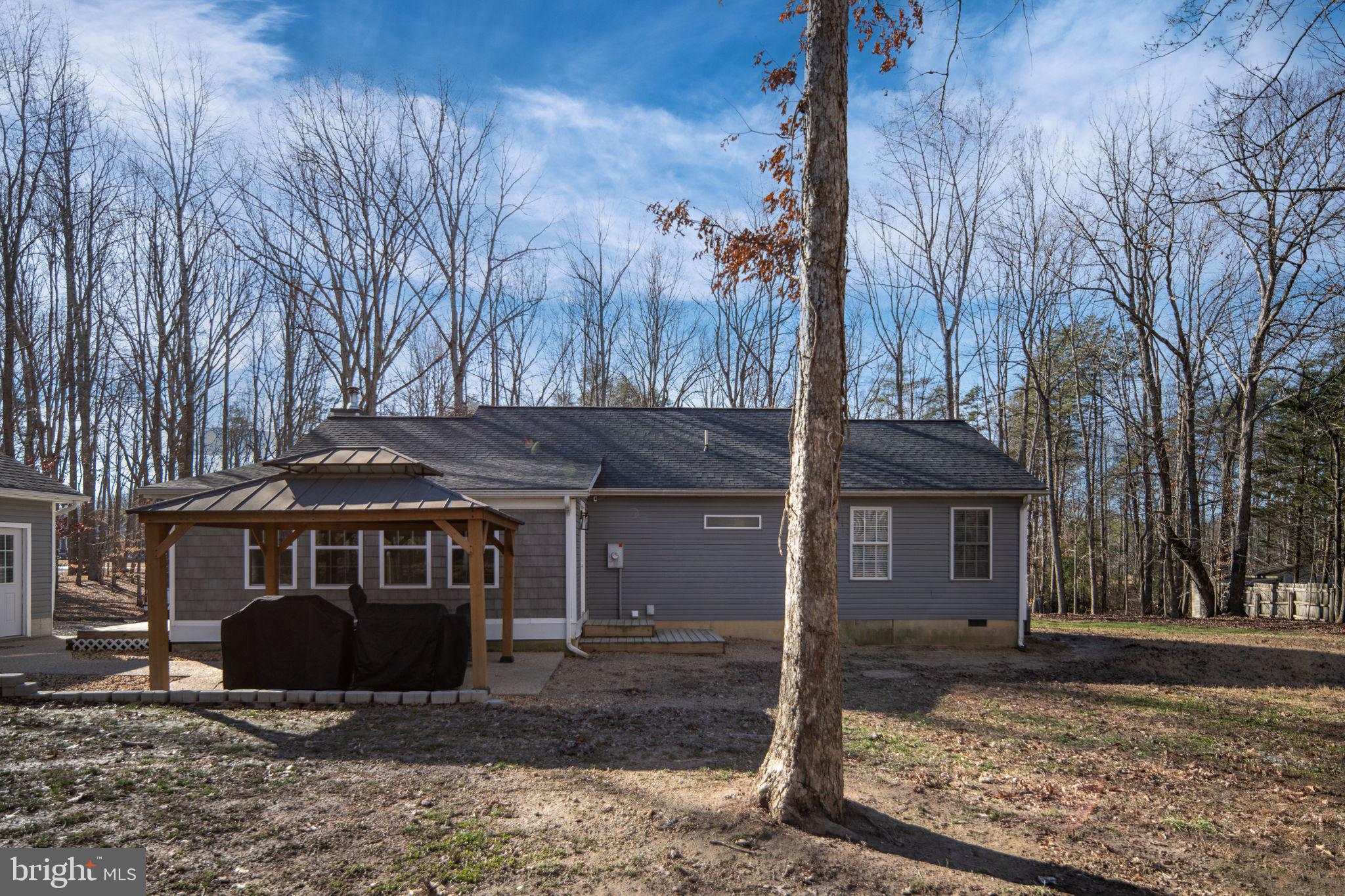 435 Halls Store Road Mineral, VA 23117 - Photo 53 of 59 a front view of a house with garden