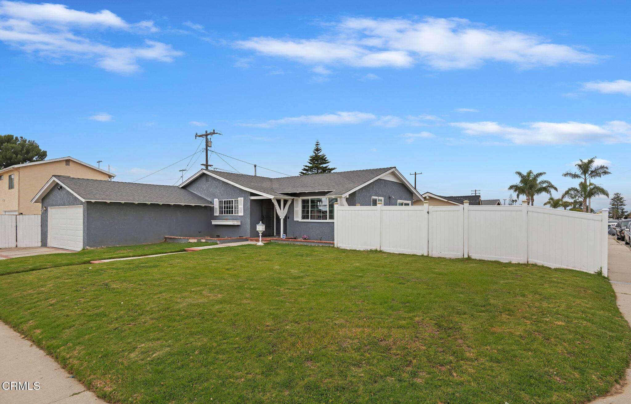 309 Rosa Street West Oxnard, CA 93033 - Photo 3 of 18 a view of a house with a yard