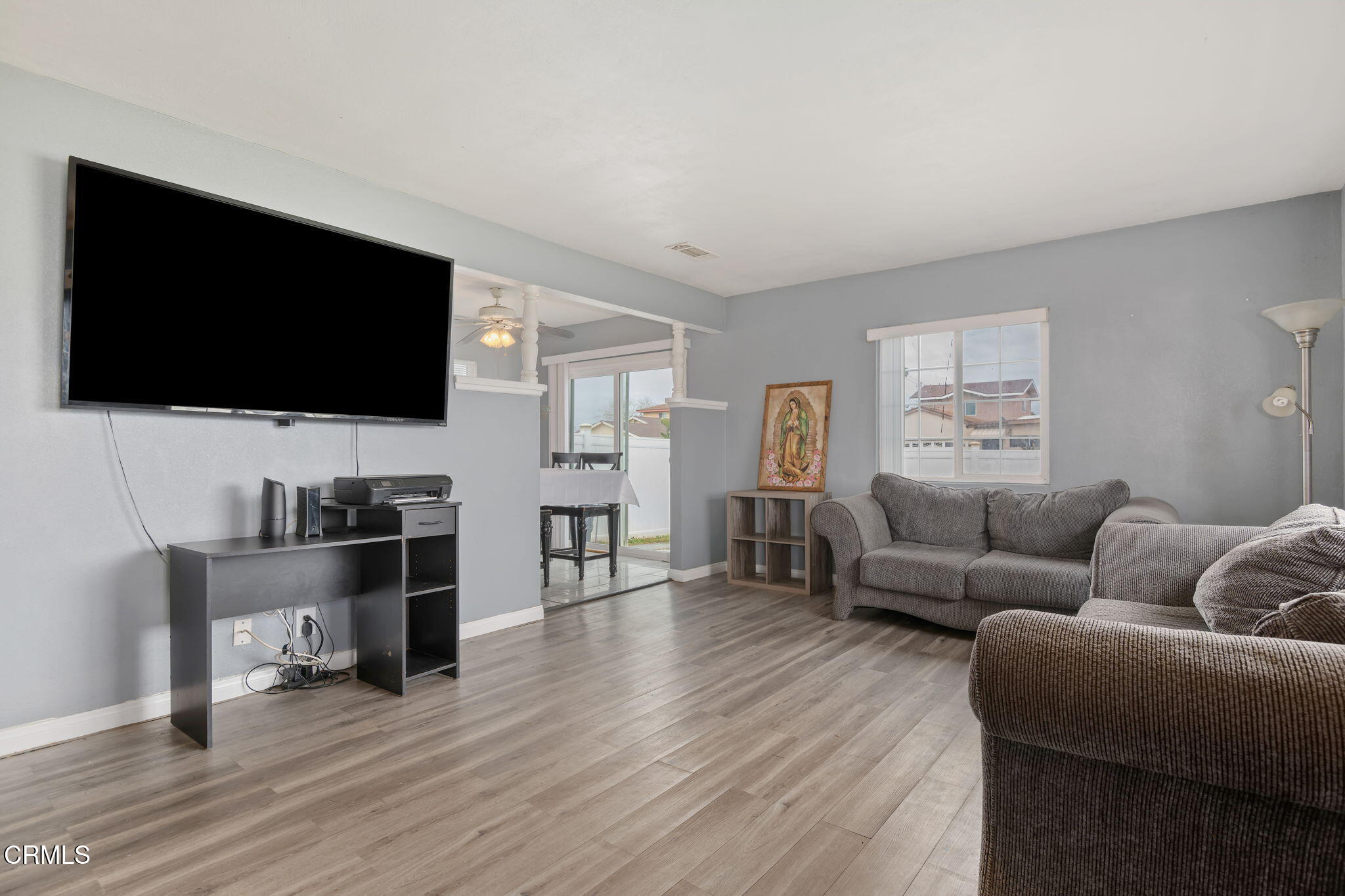 309 Rosa Street West Oxnard, CA 93033 - Photo 5 of 18 a living room with furniture and a flat screen tv