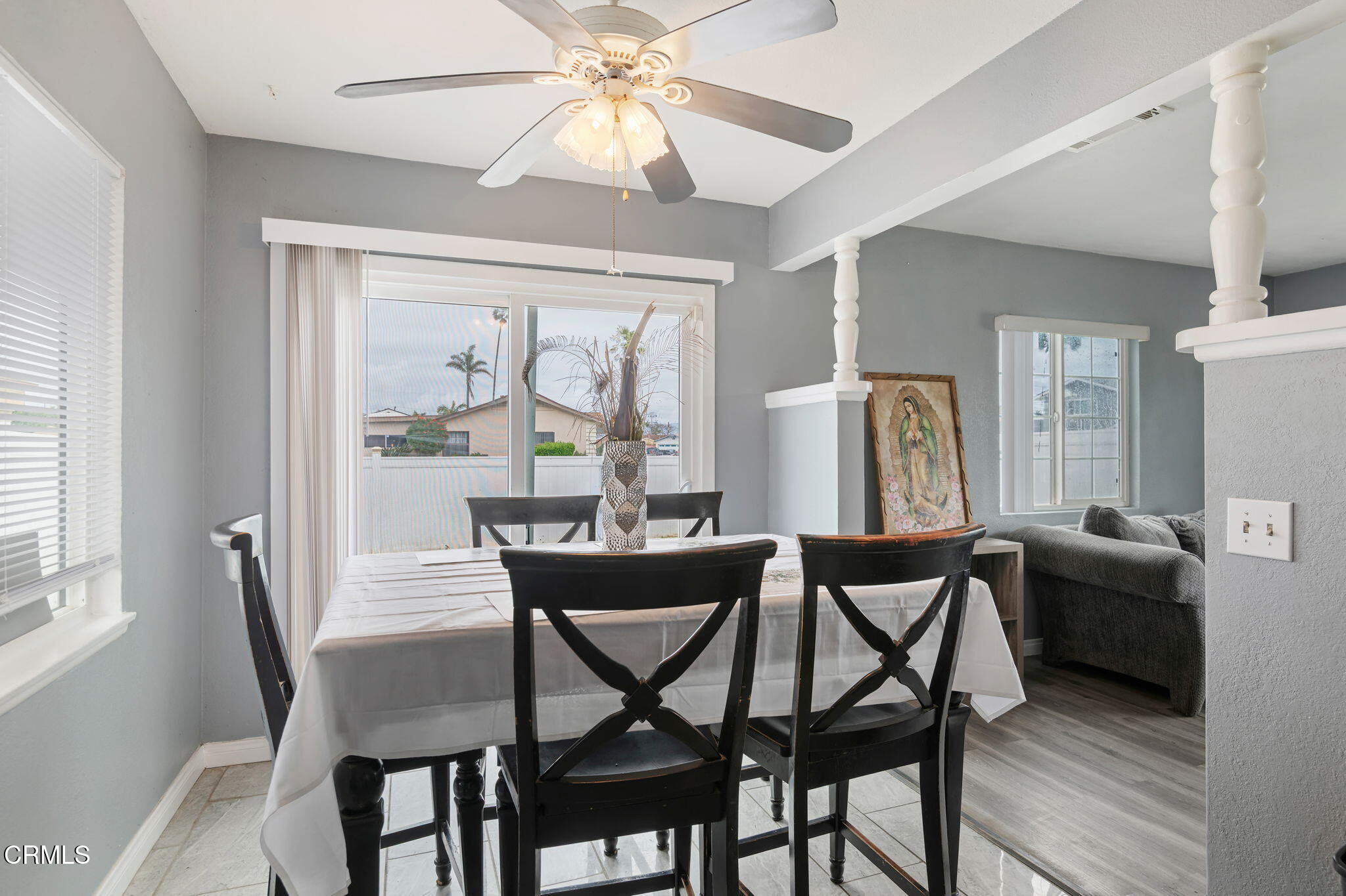 309 Rosa Street West Oxnard, CA 93033 - Photo 8 of 18 a dining room with furniture a chandelier and wooden floor