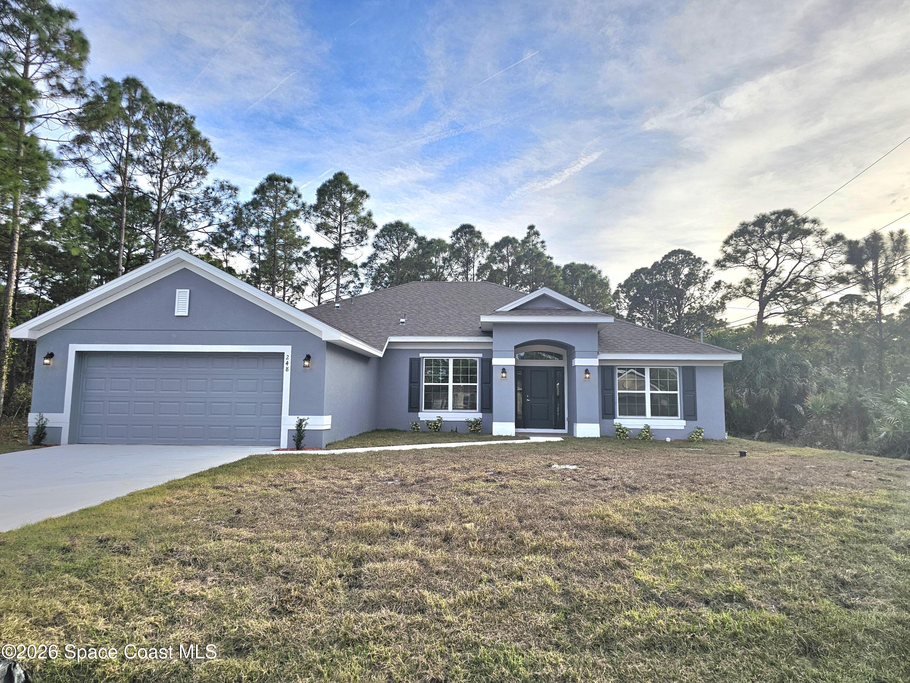 248 Tucson Road Southwest Palm Bay, FL 32908 - Photo 1 of 19 248 Tucson Exterior
