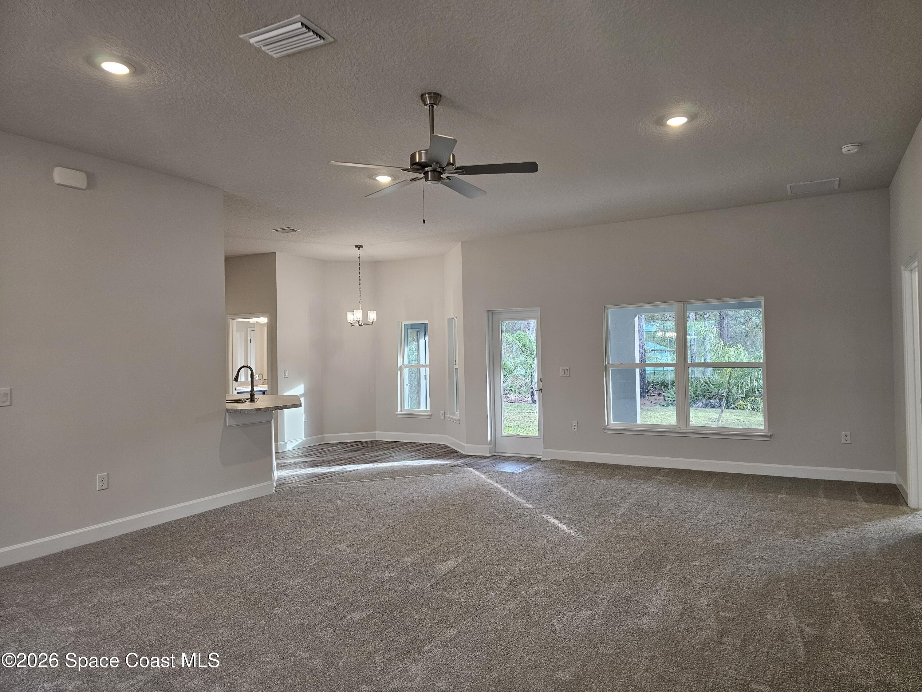 248 Tucson Road Southwest Palm Bay, FL 32908 - Photo 4 of 19 20260114_163615