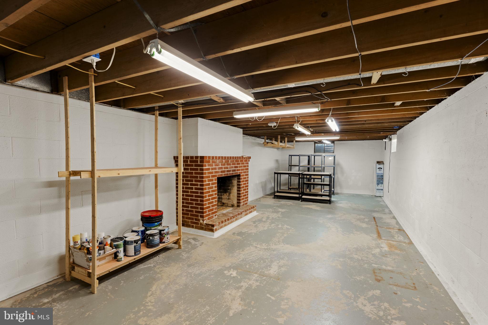 406 South Church Street Quarryville, PA 17566 - Photo 17 of 24 a view of an empty room with a fireplace