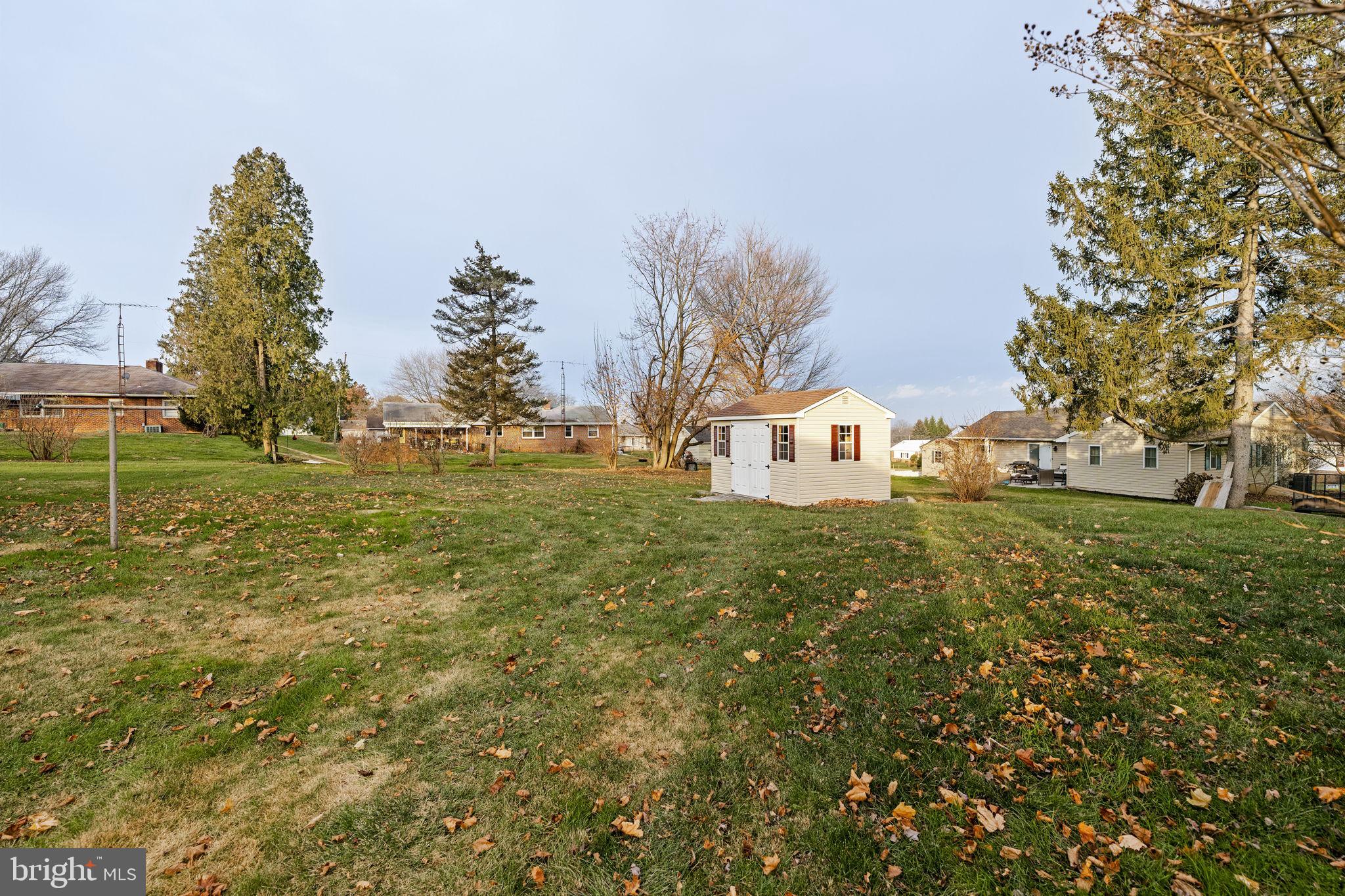 406 South Church Street Quarryville, PA 17566 - Photo 19 of 24 a view of a house with a yard