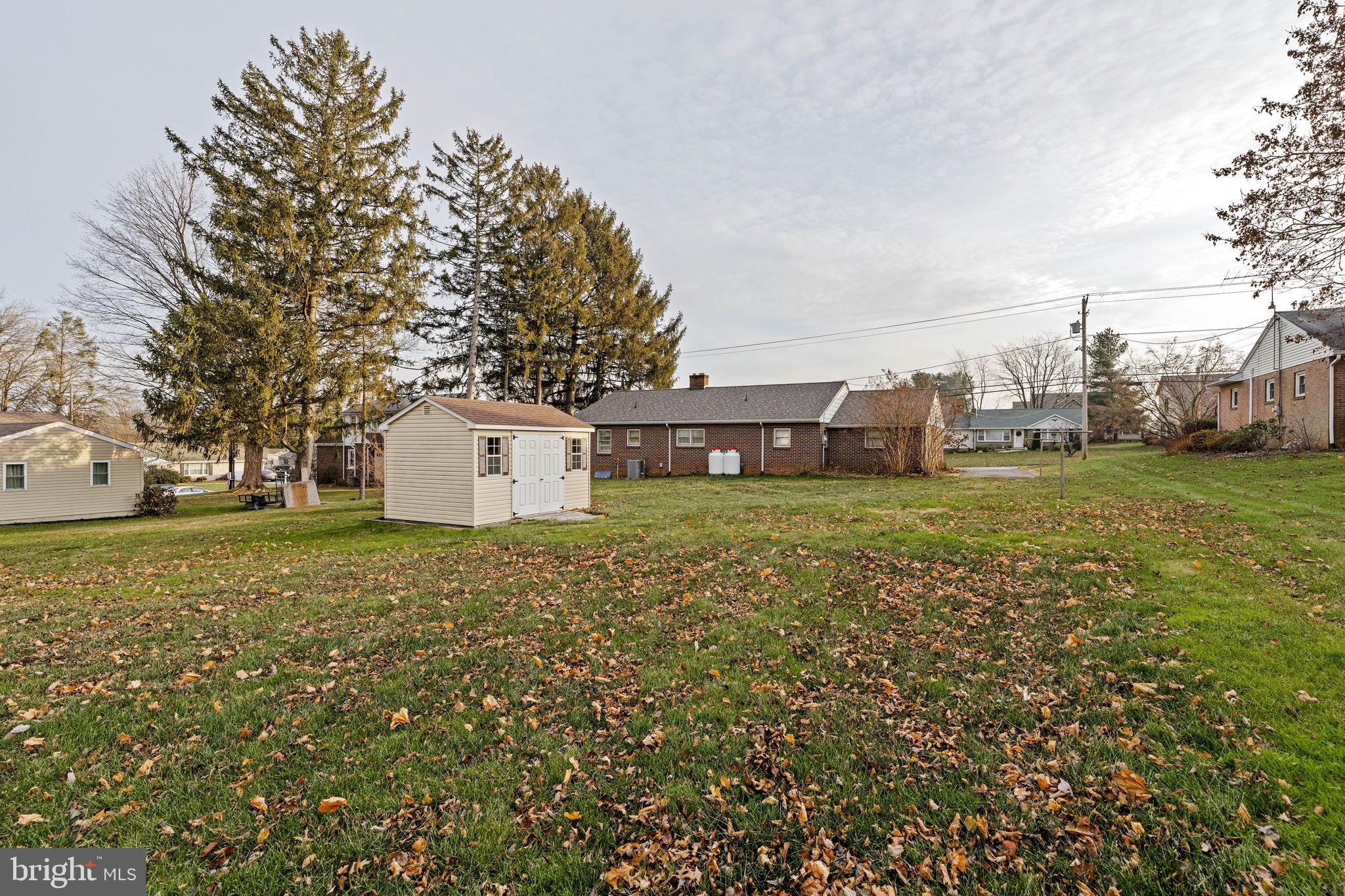 406 South Church Street Quarryville, PA 17566 - Photo 20 of 24 a view of a house with a yard