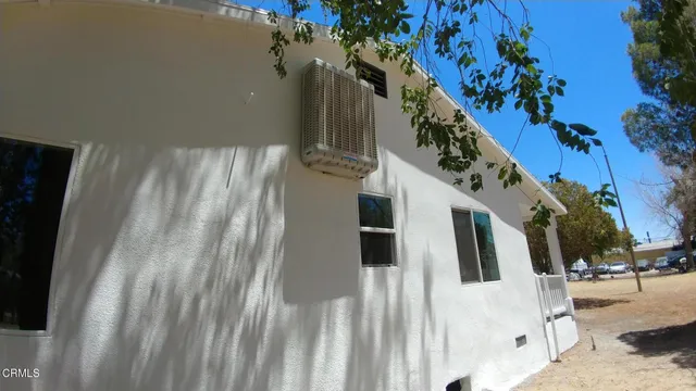 a view of a house with a white house
