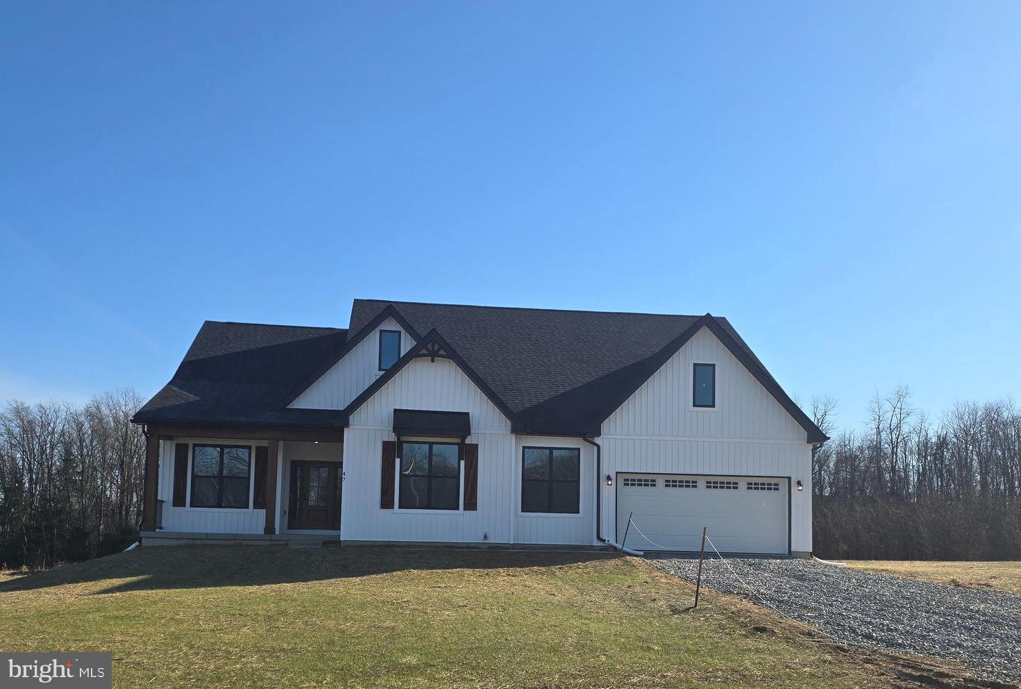 47 Rakes Road Shenandoah Junction, WV 25442 - Photo 1 of 58 a front view of a house with a yard