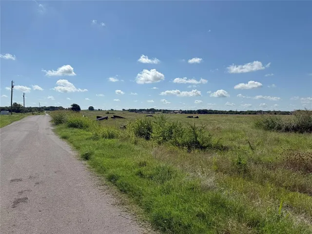 a view of a lake from a yard
