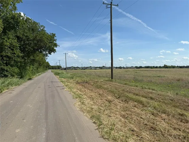 a view of an ocean and a yard