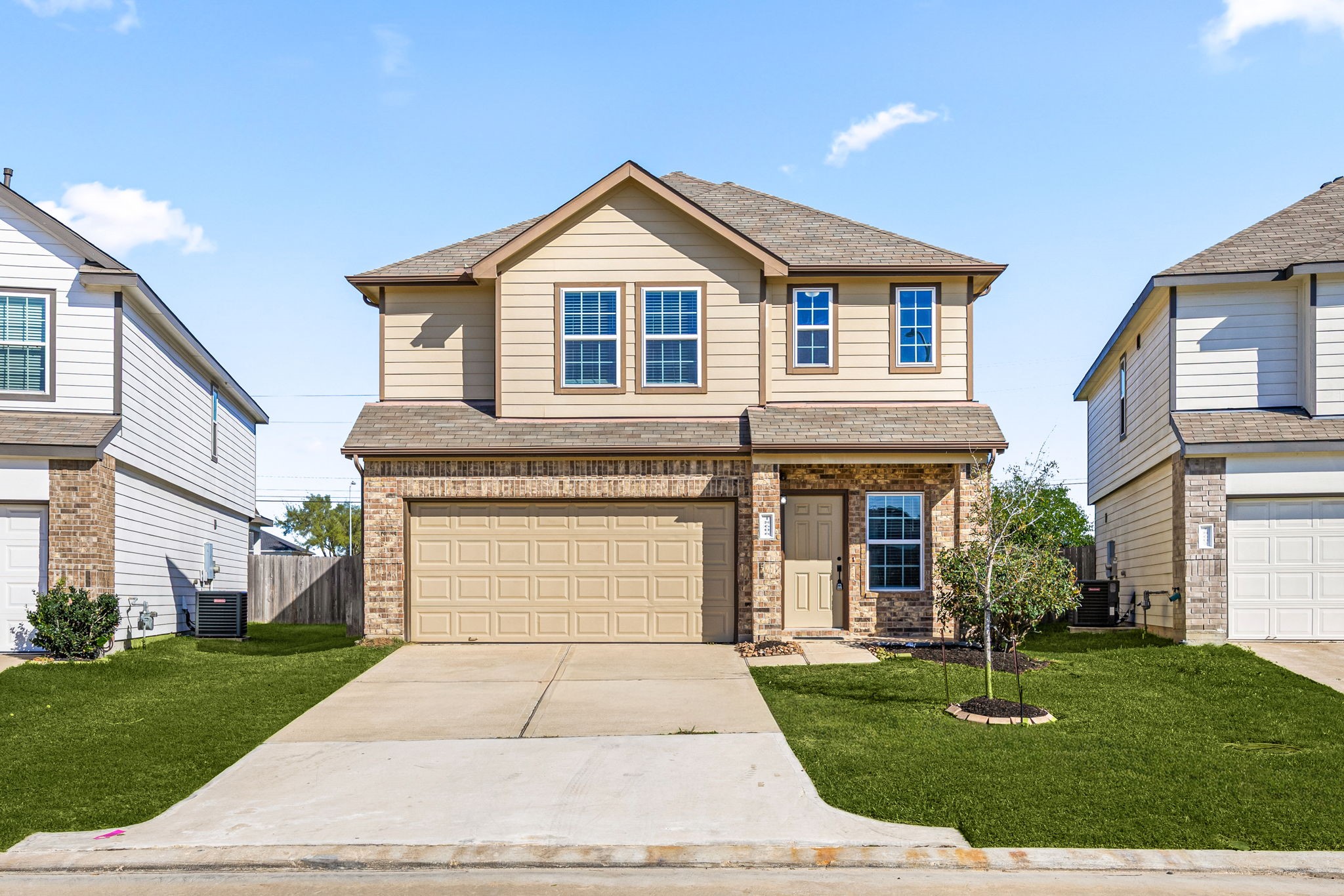 18606 Lansdowne Stream Path Katy, TX 77449 - Photo 5 of 39 a front view of a house with garden