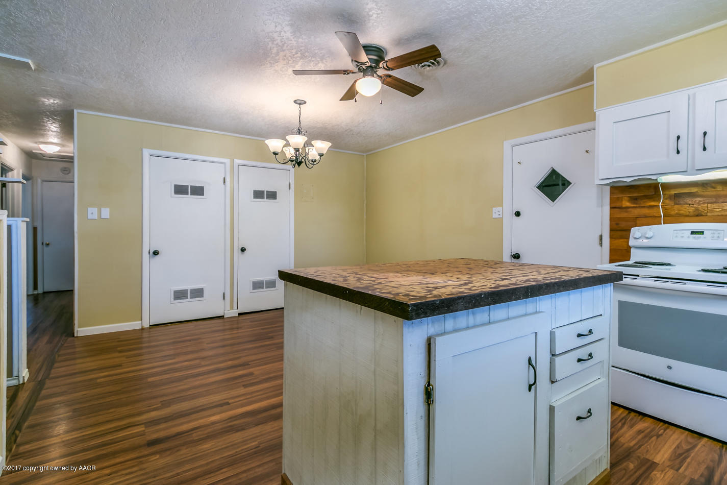 4708 South Fannin Street Amarillo, TX 79110 - Photo 8 of 16 a kitchen with stainless steel appliances granite countertop a sink a stove and refrigerator
