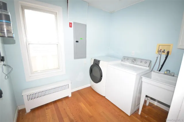 a utility room with dryer and washer